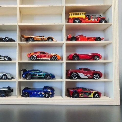 Деревянная полка для автомобилей Kruzzel 21997 настенный гараж на 90 ячеек 27617 фото
